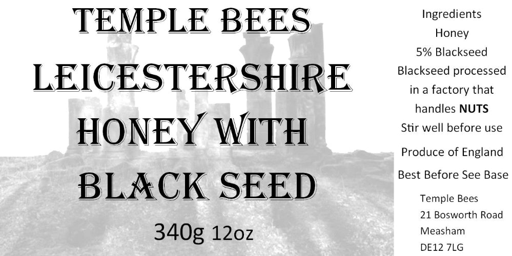 Honey with black seed packaging label showing product details and branding.
