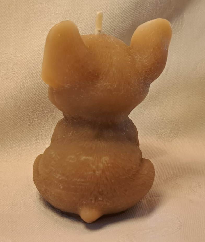Back view of beeswax French Bulldog candle