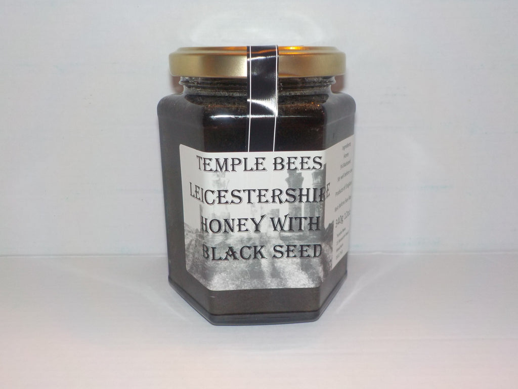 Jar of Temple Bees Leicestershire Honey with Black Seed on a white background