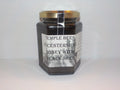 Jar of Temple Bees Leicestershire Honey with Black Seed on a white background